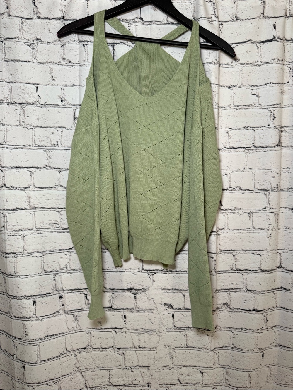 Green cross back sweater. Size L